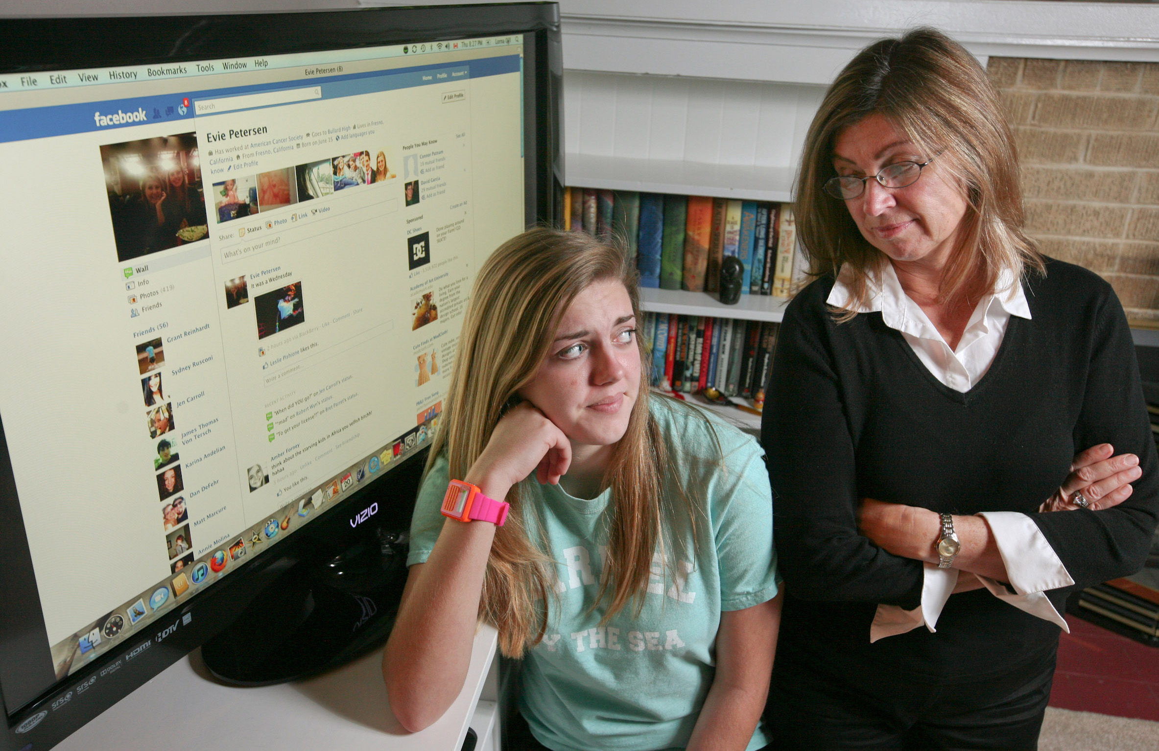 Evie Petersen, left, likes having friends on Facebook, but doesn't especially want her mother, Gretta Petersen, right, to be one of them. Evie has friended, unfriended, refriended and then unfriended her mom. (Craig Kohlruss/Fresno Bee/MCT)